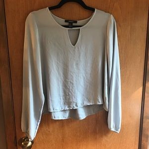 Cute greyish blue blouse.